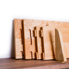Joinery details for wall mounted cherry wood book stop book shelf | Biglow Woodcraft