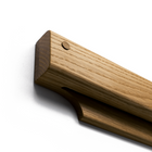Gravity Bar wall mounted paper holder close up fine detail shot of handcrafted hardwood product - Biglow Woodcraft - White Oak